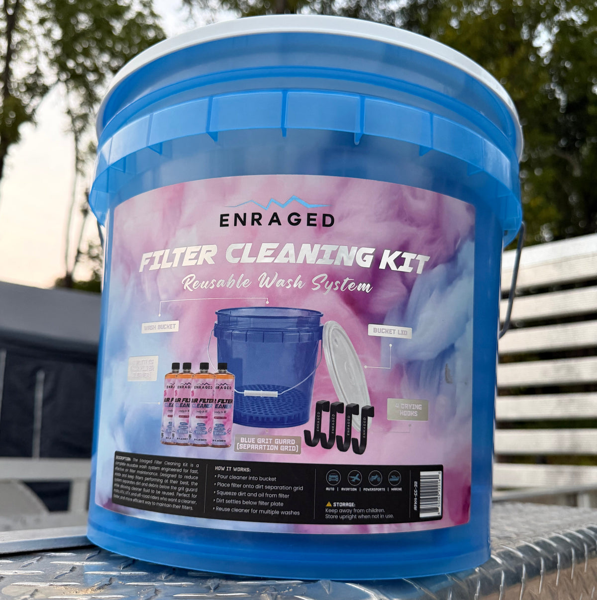 Enraged Filter Cleaning Kit bucket labeled with the wash bucket, lid, separation grid, four drying hooks, and four bottles of cleaner.